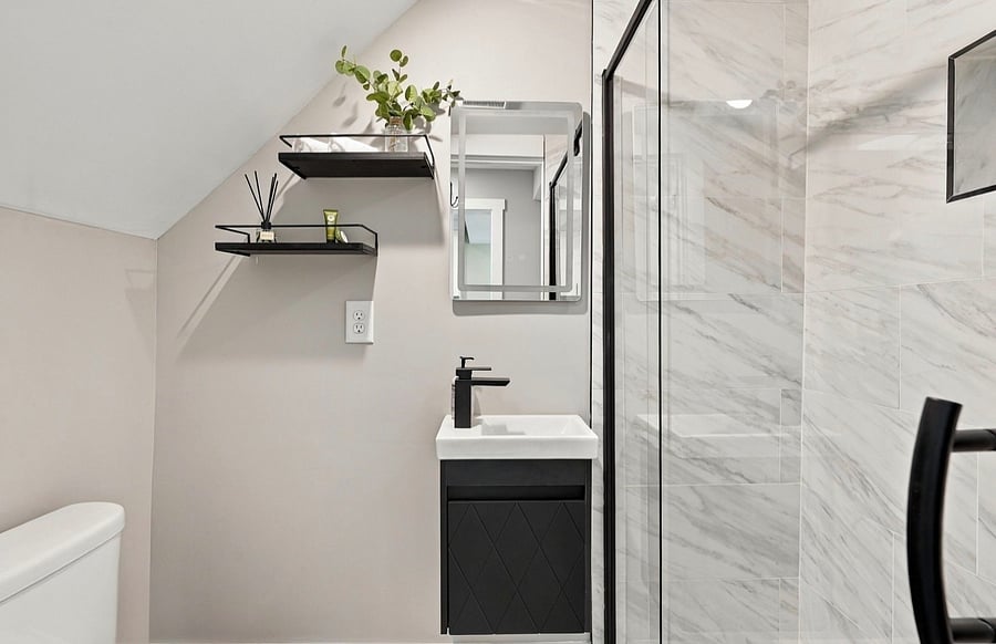 Bathroom with modern vanity and glass shower
