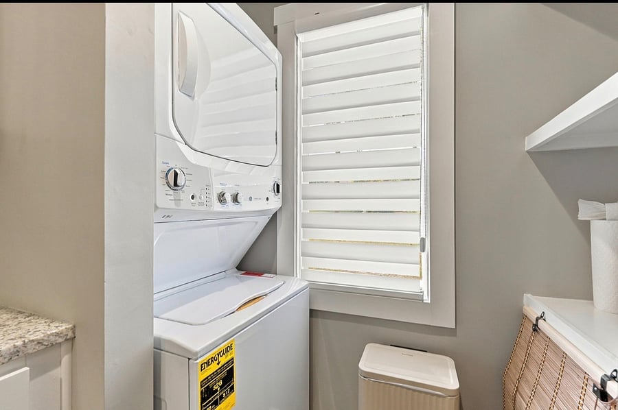 In-unit stacked washer and dryer