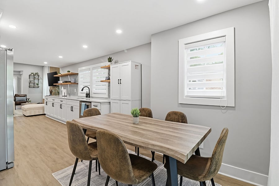 Dining table for six next to the kitchen