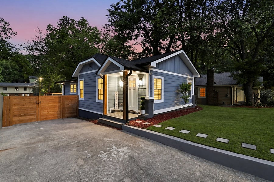 Renovated East Point home exterior at dusk