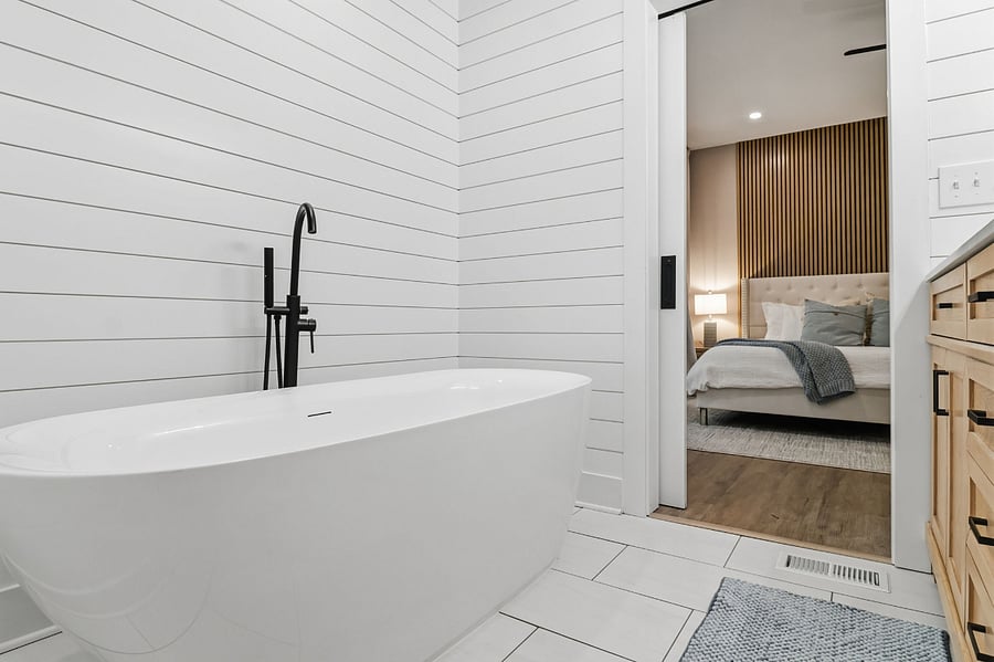 Freestanding soaking tub in the primary bath
