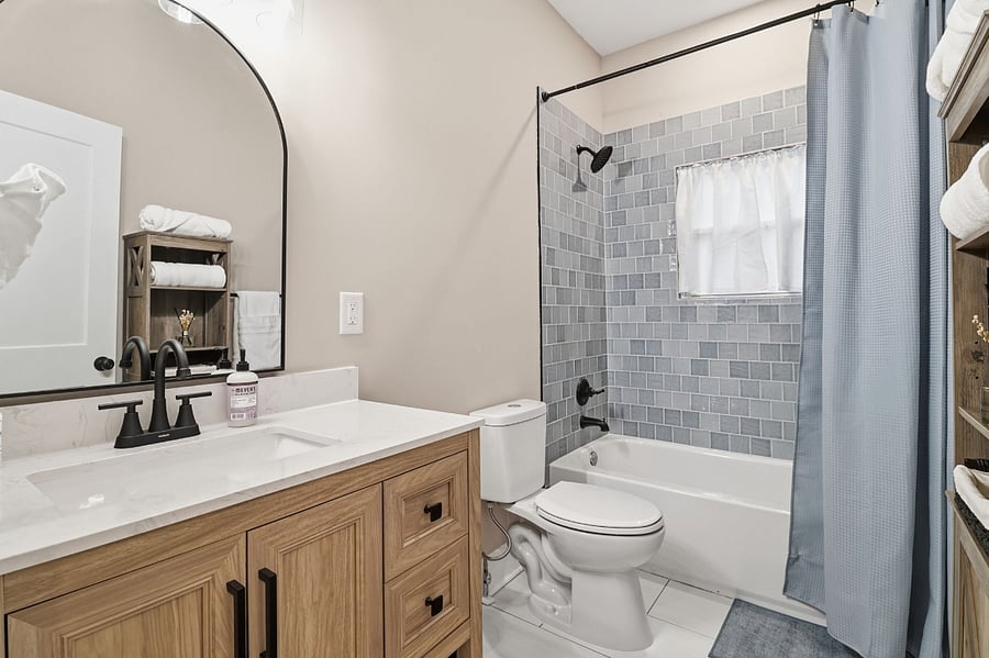 Second bathroom with tub and shower