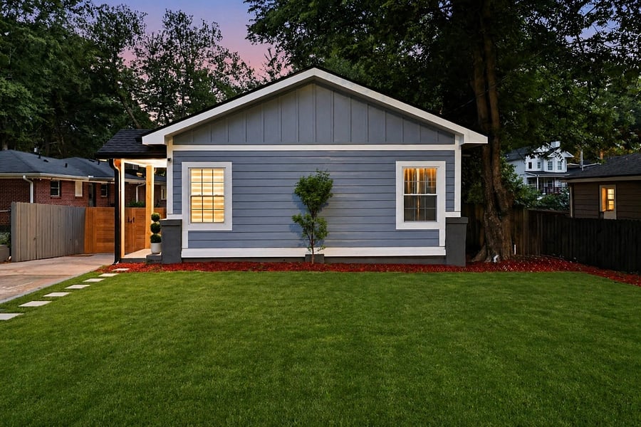 Fenced backyard with lawn
